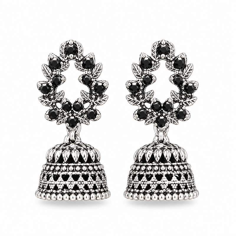 Oxidised silver black stone leaf wreath jhumka earrings on white background