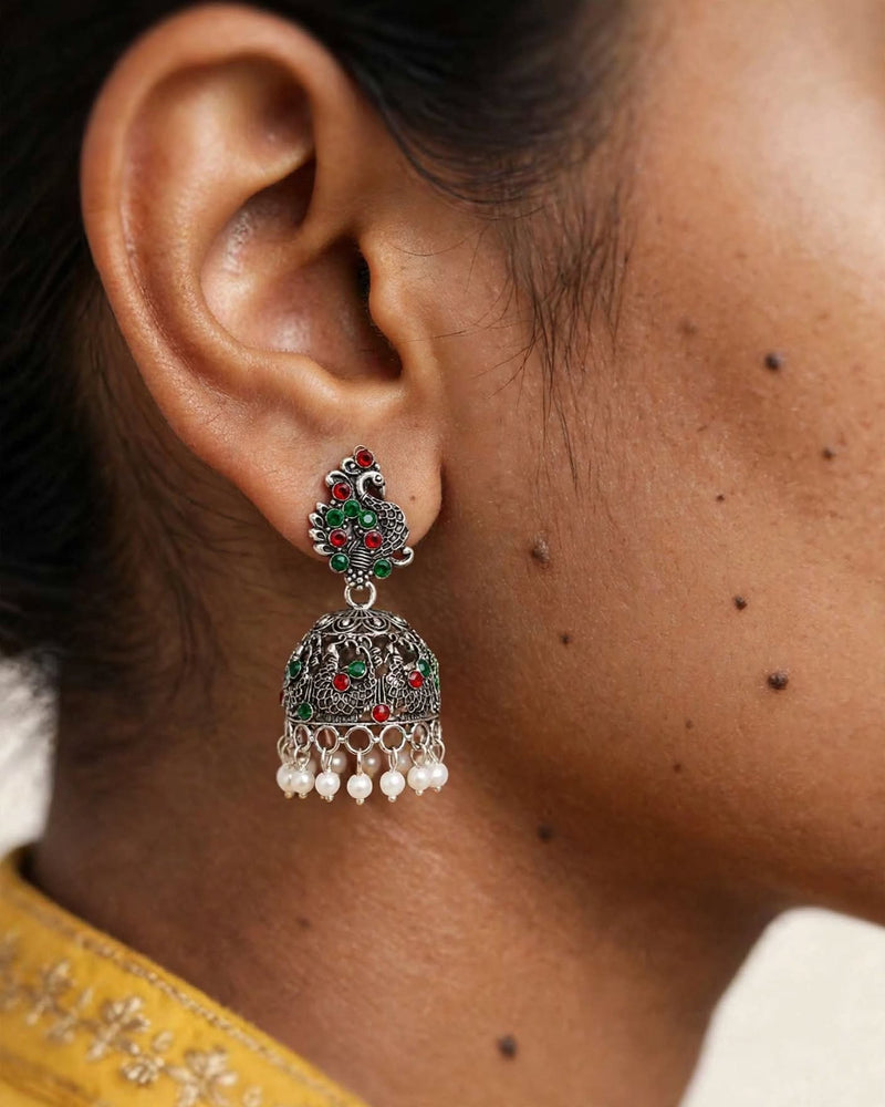 Oxidised Silver Peacock Jhumka Earrings with Red and Green Stones and Pearl Drops
