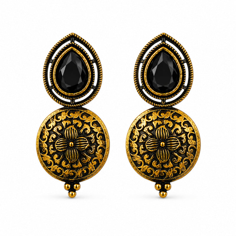 Antique gold drop earrings with black pear stone and carved floral disc