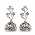 Silver jhumka earrings with floral vine top and rainbow crystals