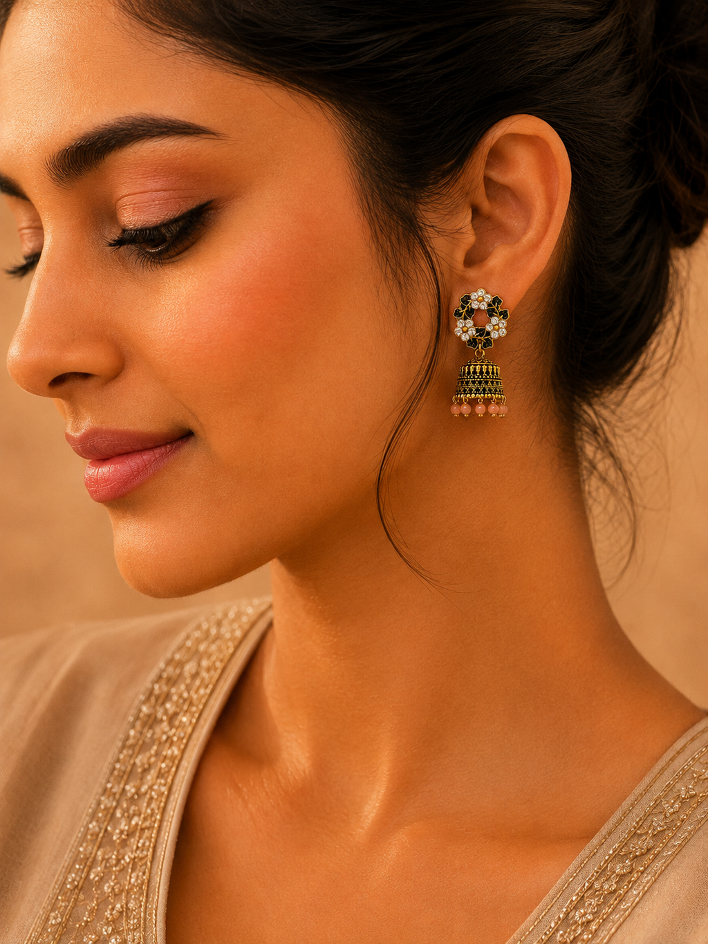 Model wearing antique gold floral wreath jhumka earrings with saree