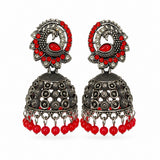 Oxidised silver peacock jhumka earrings with red stones