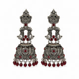 Oxidised silver Lakshmi peacock jhumka earrings with red beads
