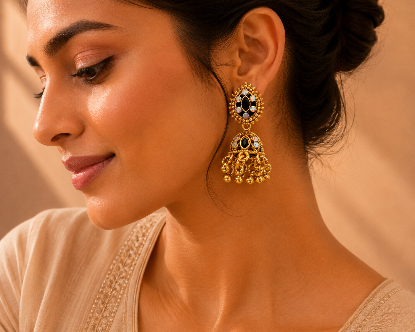 Gold oxidised jhumka earrings styled as traditional Indian bridal jewelry